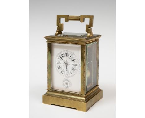 Travel clock; late 19th century.Bronze and bevelled.No key preserved.Measurements: 17 x 10 x 9 cm.Travel or carriage clock wi