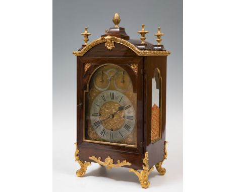 Bracket clock; late 19th-early 20th century.Rosewood and gilt bronze.Chronograph with chime.  Measurements: 59 x 28 x 18 cm.B