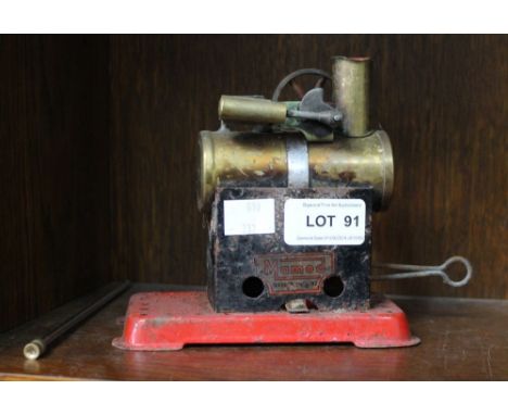 A vintage Mamod brass and tin stationary steam engine