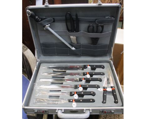 Prima - A set of knives and BBQ tools in metal carry case unused as new