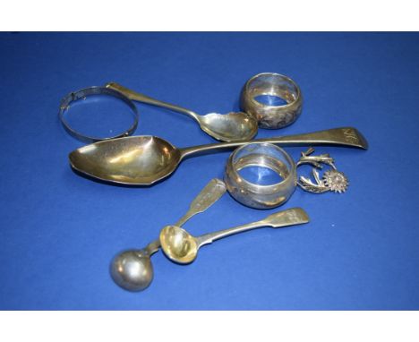 Two silver napkin rings; together with a silver hinged bracelet; pair of salt spoons and other items, 159g.