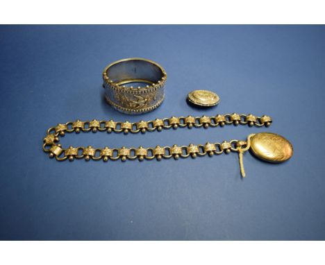 A Victorian silver cuff bangle having swallow and floral engraving; together with an ornate Victorian silver engraved link co