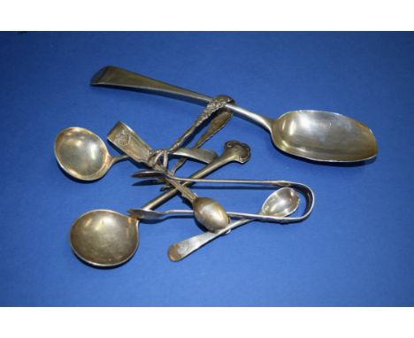Three pairs of silver sugar tongs and four various silver spoons, 175g.