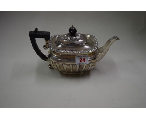 An Edwardian silver bachelor's teapot, by William Neale, Chester 1902, 346g all in.   Condition Report:  Overall commensurate