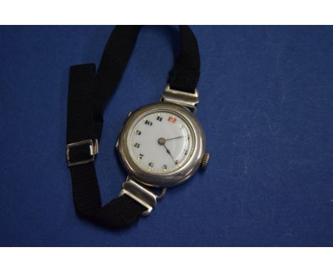 A Vintage silver cased ladies Rolex wristwatch, having unsigned 2cm white enamel dial decorated Arabic numerals, signed movem