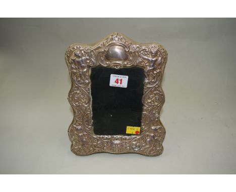 A silver photograph frame, by R H, Birmingham 1997, 24cm.