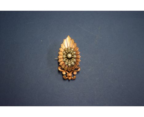 A Continental yellow metal pendant brooch, the centre decorated pearl cluster.