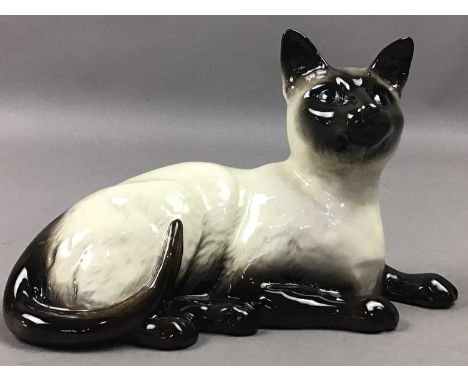 BESWICK MODEL OF A CAT,18.5cm long, along with several other ceramic animals