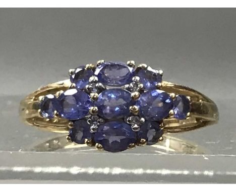 TANZANITE AND DIAMOND RING,in nine carat gold