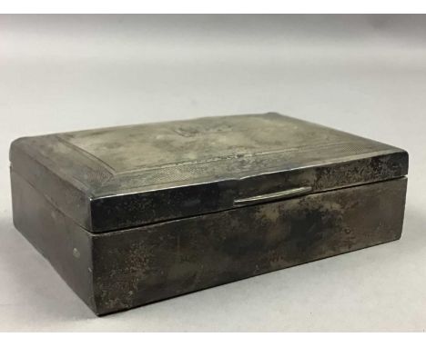 SILVER OBLONG CIGARETTE BOX,Birmingham (marks rubbed) along with two silver brooches, seed pearl set brooch and a monocle (5)