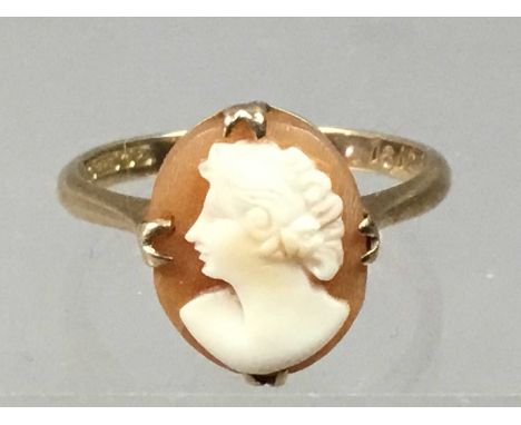 GOLD CAMEO DRESS RING,along with an eighteen carat gold wedding ring (2)