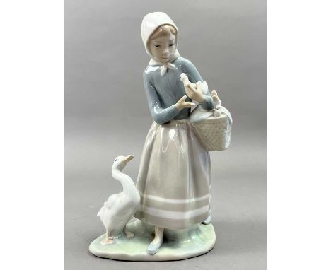 LLADRO FIGURE OF A GIRL WITH GEESE,23cm high, along with another Lladro figure, a Nao figure and a pair of Beswick kingfisher