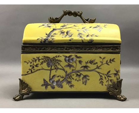 REPRODUCTION CERAMIC AND GILT CASKET,21cm high, along with a gilt and cream lidded jar (2)