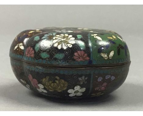 CHINESE CLOISONNE ENAMEL LIDDED BOX,of shaped circular form, decorated with panels of flowers, 6.5cm wide