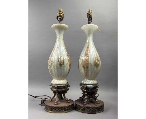 PAIR OF GLASS AND BRASS TABLE LAMPS,61cm high, along with a gilt painted oil lamp base, converted for electricity with a glas