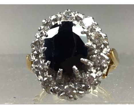 SAPPHIRE AND DIAMOND CLUSTER RING,set in eighteen carat gold