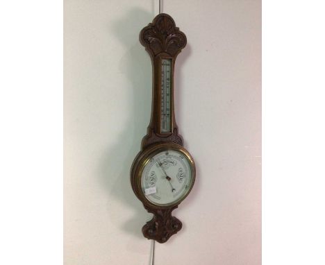 EARLY 20TH CENTURY CARVED OAK BANJO BAROMETER,82cm long 