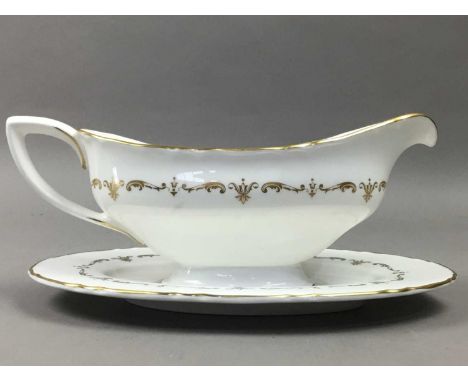 ROYAL WORCESTER PART DINNER SERVICE,with gilt decoration on a white ground 