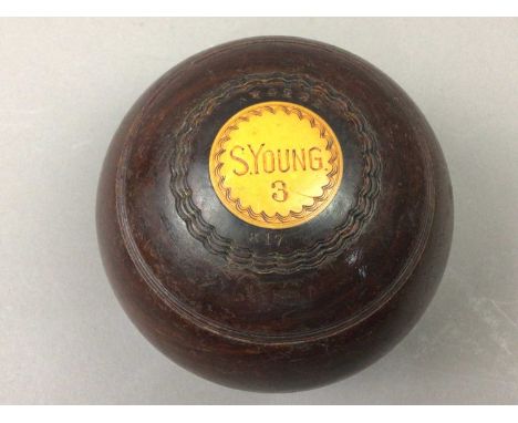 SET OF FOUR LAWN BOWLS,size 3, in Slazenger case, along with a small collection of tools contained in a hard case