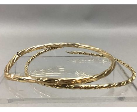 NINE CARAT GOLD BANGLE, along with another (2)