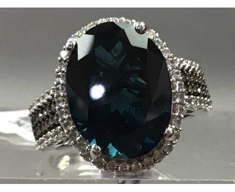 LONDON BLUE TOPAZ AND DIAMOND RING,in silver
