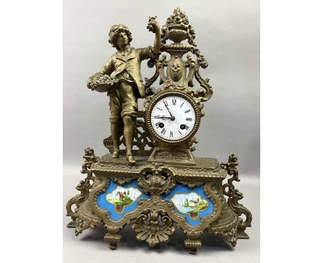 19TH CENTURY FRENCH GILT METAL MANTEL CLOCK,with two train movement, stricking on a bell, modeled with a young man holding a 