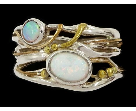 Silver and 14ct gold wire two stone opal ring, stamped 925Condition Report:Size R-S, max depth = 13mm