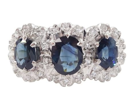 18ct gold sapphire and diamond triple cluster ring, three graduated oval sapphires within a border of illusion set round cut 