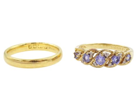 22ct gold wedding ring and a 9ct gold tanzanite and diamond ring, five graduated tanzanite's spaced by round brilliant cut di