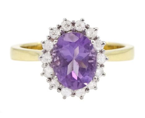 18ct gold oval cut amethyst and round brilliant cut diamond cluster ring, hallmarkedCondition Report:Approx 4.45gm, size M-N,