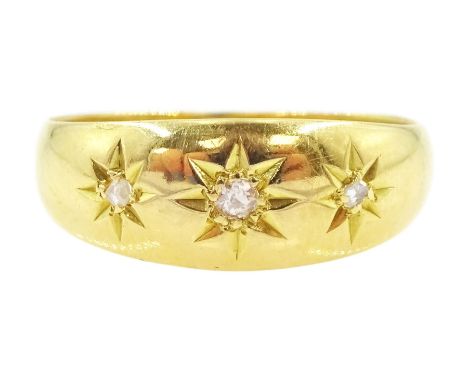 18ct gold diamond three stone ring, three star set graduated round cut diamond to a tapering band, hallmarked Chester 1906Con