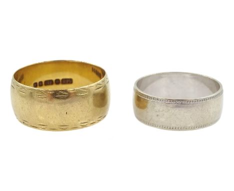 Gold broad wedding ring, and a white gold wedding ring, both hallmarked 9ctCondition Report:Approx 8.6gm gross, size Q and M1