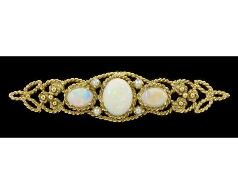 9ct gold opal and seed pearl brooch, three graduated oval opals flanked by seed pearls, to a rope wire frame, hallmarkedCondi