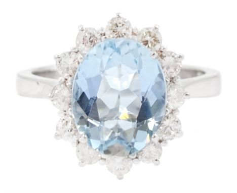18ct white gold oval cut aquamarine and round brilliant cut diamond cluster ring, hallmarked, aquamarine approx 2.040 carat, 