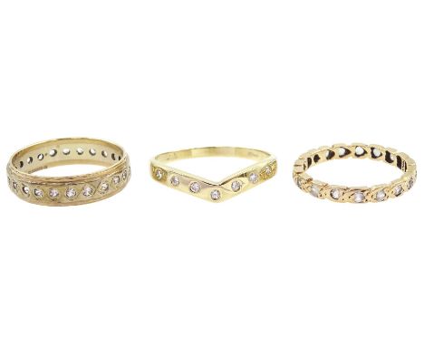Gold diamond wishbone ring and two gold white stone eternity rings, all 9ctCondition Report:Approx 6.0gm gross, sizes Q, N an