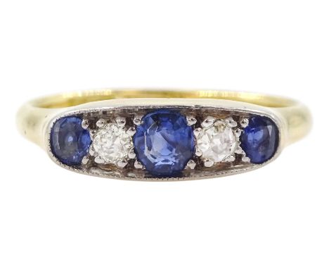 Early 20th century gold sapphire and diamond ring, three graduated cushion cut sapphires spaced by round cut diamonds, stampe