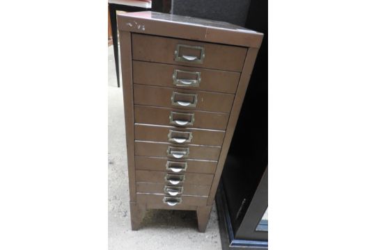 A Vintage Short Metal Filing Cabinet Having Ten Drawers With A