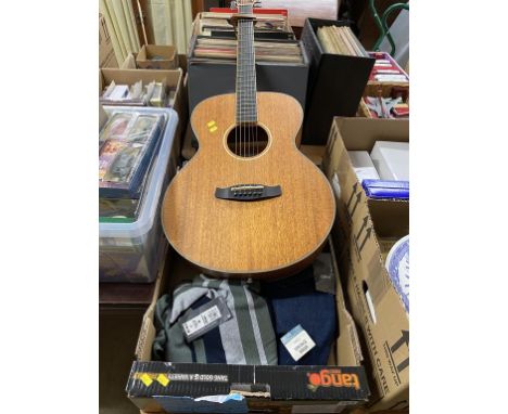 A Tanglewood guitar and various clothes