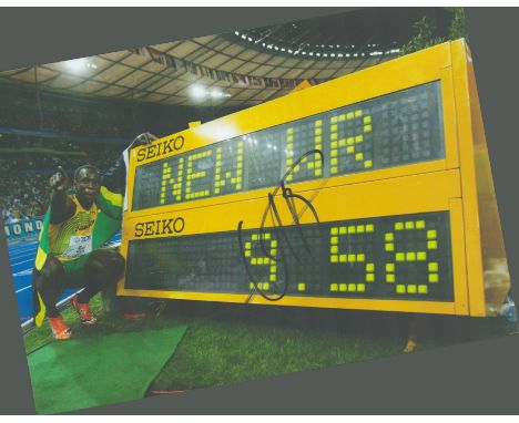 Usain Bolt signed 12x8 colour photo. Bolt, OJ, CD, OLY is a retired Jamaican sprinter, widely considered to be the greatest s
