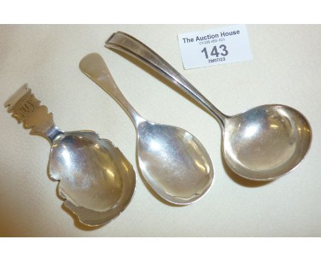 Georgian silver caddy spoon hallmarked for 1829, Thomas Johnson I, another silver caddy spoon and a silver sauce ladle. Combi