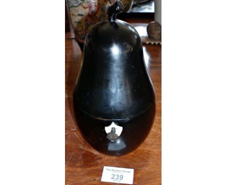 Ebonised wood pear-shaped tea caddy with key, lined, 7" high