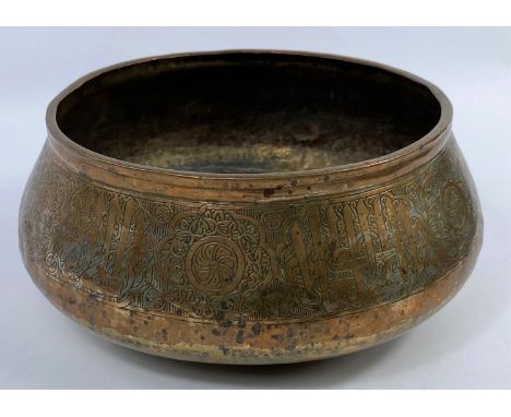 An Indian brass on tin bowl with traditional decoration, d. 27cm -&nbsp;(Middle Eastern brass basin with applied tinning, som