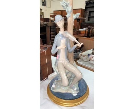 A Lladro group:  violinist by a tree (violin a.f.) 