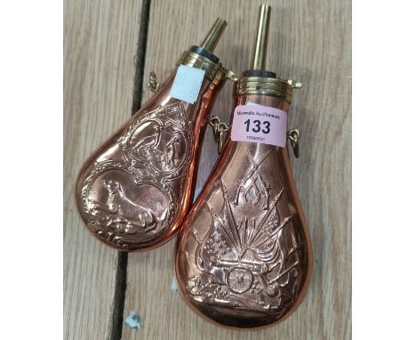 A brass mounted copper flask American style embossed decoration, 20cm and another similar, 16cm 