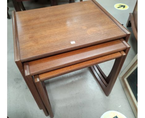 A 1960's G-Plan teak nest of 3 occasional tables. In good condition with light surface wear