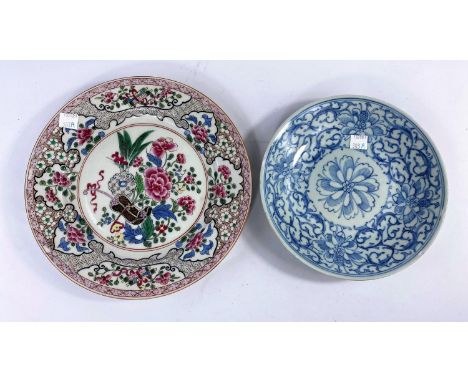 A 19th century Chinese blue and white plate with seal mark to base, d. 19.5cm and another Chinese plate, restored, d. 24cm (B