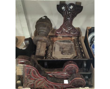 An ebony and bone inlaid mirror, in need of restoration; other carved wooden items 