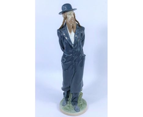A Lladro figure: orthodox Jewish gentleman, height 38 cm. Condition report for lot 443In good condition with no obvious signs