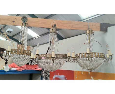 A pair of 6 branch centre light fittings/chandeliers in gilt metal and faceted glass beads; a similar smaller fitting (rewiri