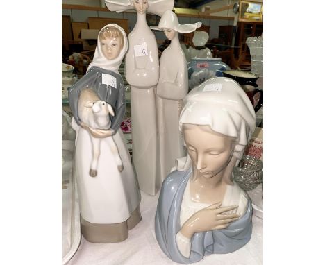 A Lladro bust of a female, a Lladro group - woman with lamb and a Lladro group of Nuns 